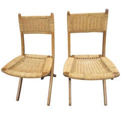 A Pair of Scandinavian Folding Chairs in the style of Hans Wegner
