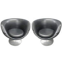 A pair of Modern Swivel Chairs on Chrome Base