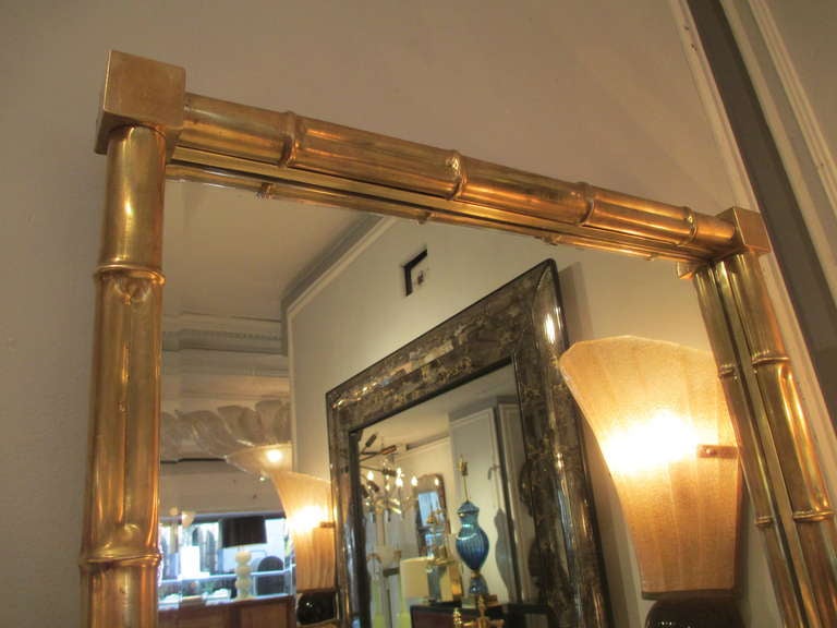 Mid-20th Century An exceptional pair of faux-bamboo brass mirrors