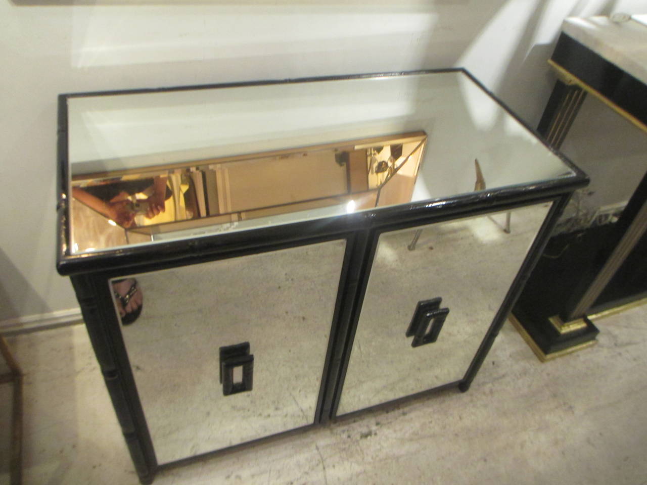 Mirrored Cabinet with ebonized faux bamboo frame In Excellent Condition In New York, NY