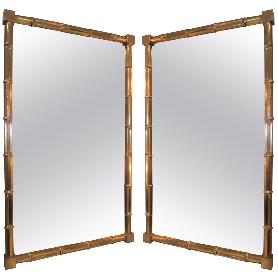 An exceptional pair of faux-bamboo brass mirrors
