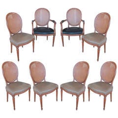 A Set of 8 louis XVI Style leather upholstered dining chairs