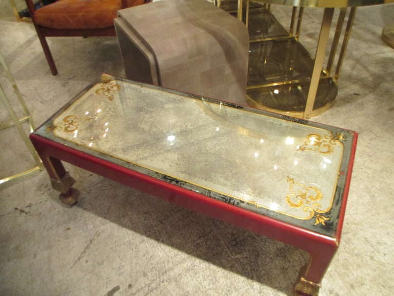 Spectacular French 40's Lacquered  Coffee Table with reverse=painted glass top