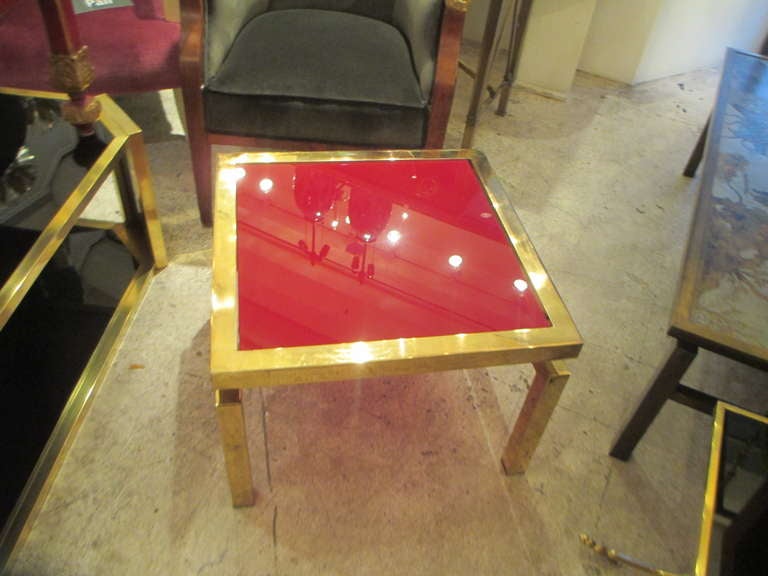 Pair of Mid-Century Modern Brass Tables with Red Glass Tops 1
