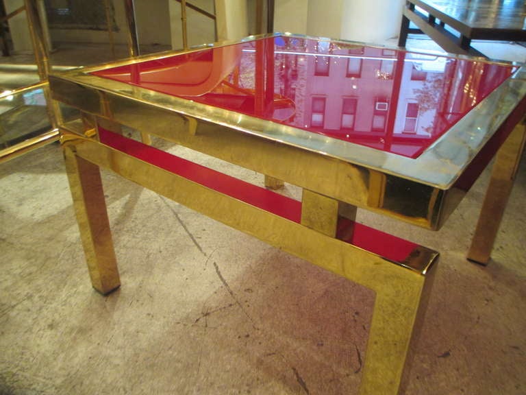 Pair of Mid-Century Modern Brass Tables with Red Glass Tops In Excellent Condition In New York, NY