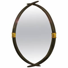 Unsual Ebonized Oval Mirror with Applied Bronze Rings