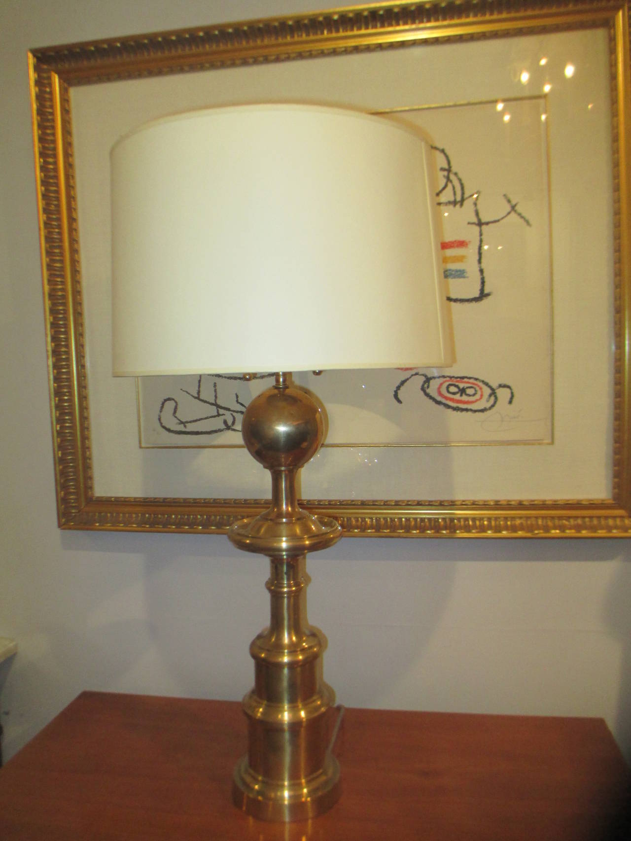 A pair of sculptural brass lamps.

Price reduced / Net price $5,500