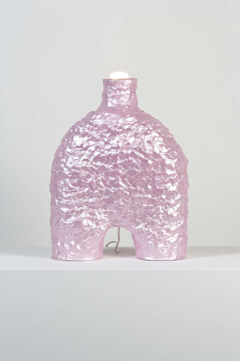 A unique metallic pink table lamp made in collaboration by Katie Stout and Sean Gerstley.