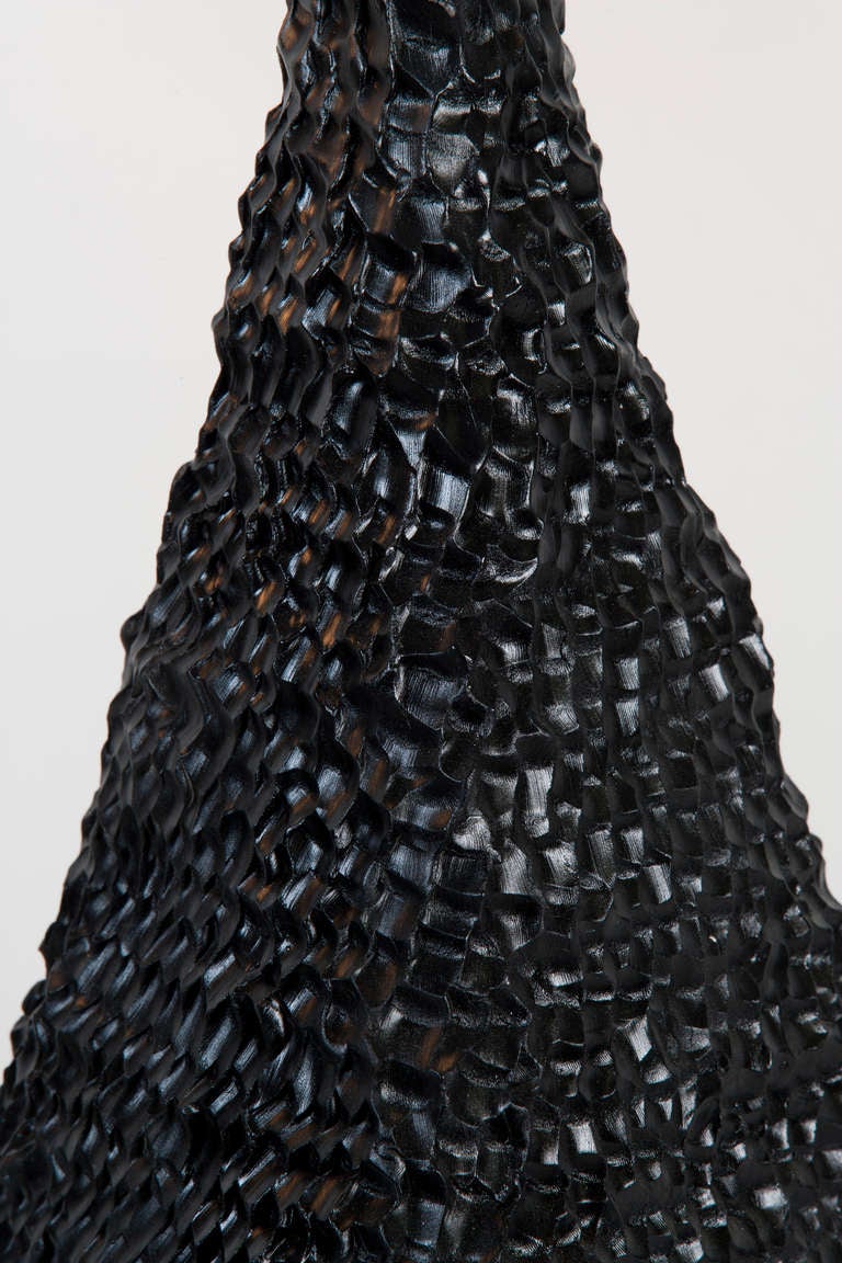 A unique pair of black pyramid table lamps made in collaboration by Katie Stout and Sean Gerstley.