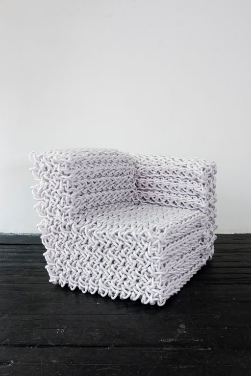 White corner chair comprised of knit rubber tubing by Kwangho Lee.