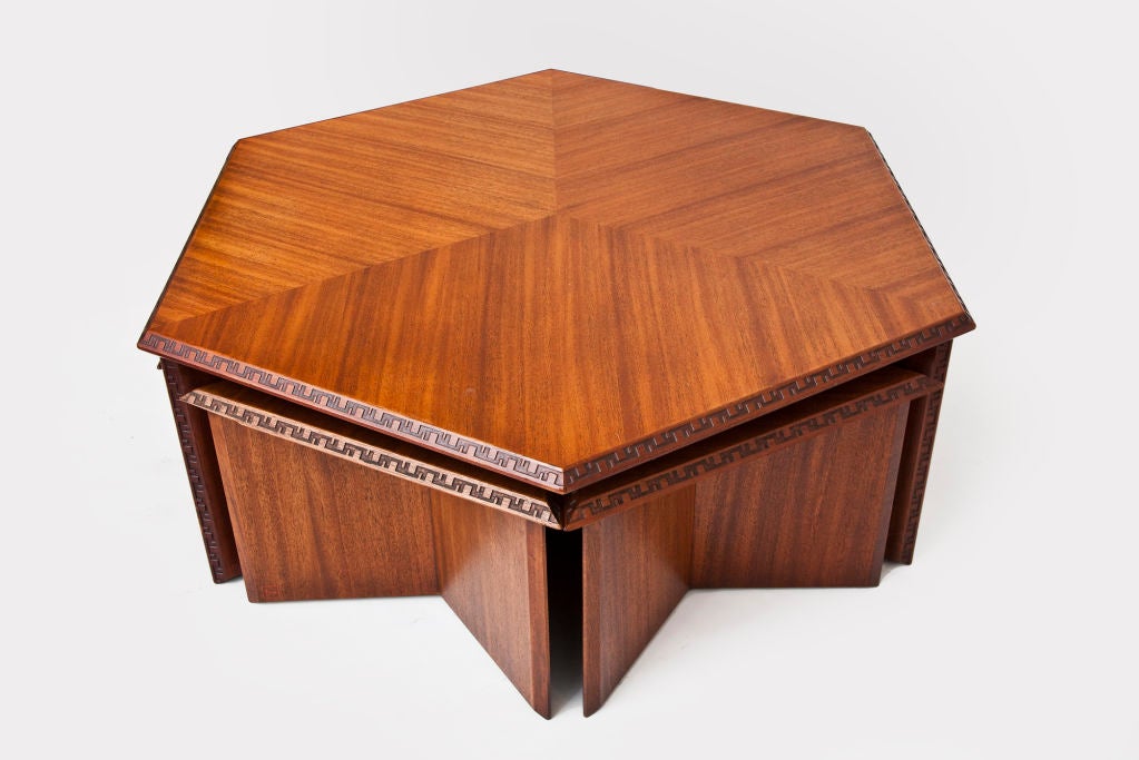 American Hexagonal Table with Six Stools by Frank Lloyd Wright