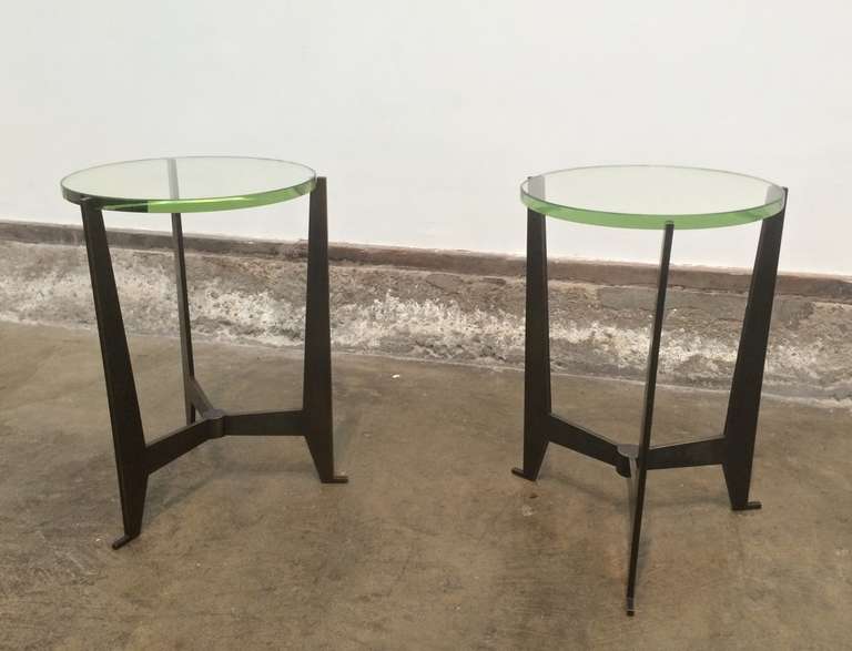 Pair of Bronze Side Tables with Glass Tops
After Jacques Quinet
circa 1960
cast bronze base, vintage beveled glass top
Approximately 24 inches high, 15 inches in diameter
Excellent condition
