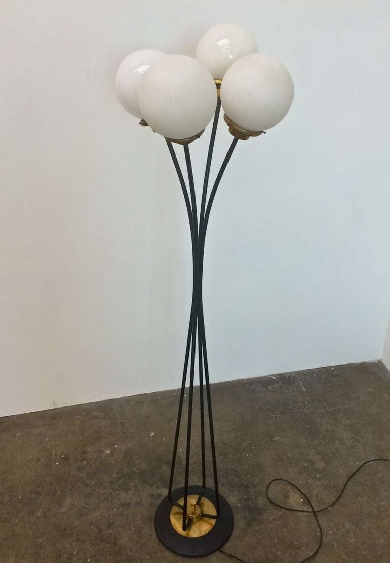 Mid-Century Floor Lamp.  American, 1950's.  Brass, metal and glass.

Approx 63 inches high, 16 inches in diameter