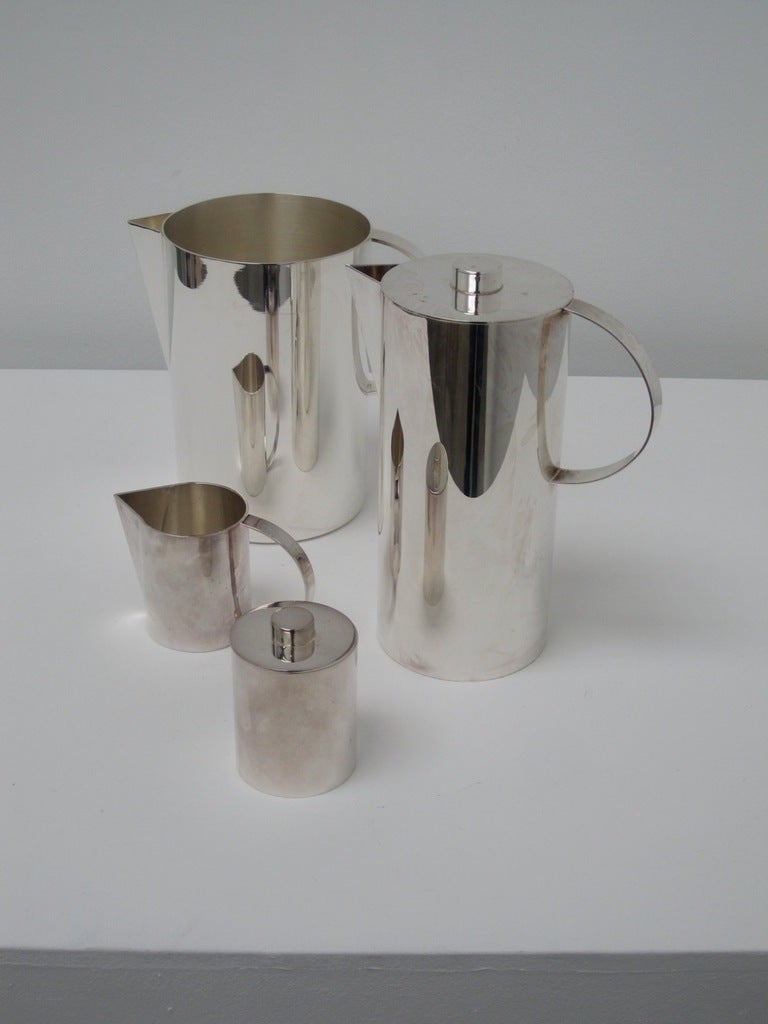 Calvin Klein
Tea and Coffee Service (4 pieces)
silver plated metal
circa 1990s
manufactured by Swid Powell
Stamped underneath

7 x 4.5 x 8 inches
7.5 x 5.5 x 8 inches
2.5 x 2.5 x 3 inches
5 x 2.5 x 3 inches