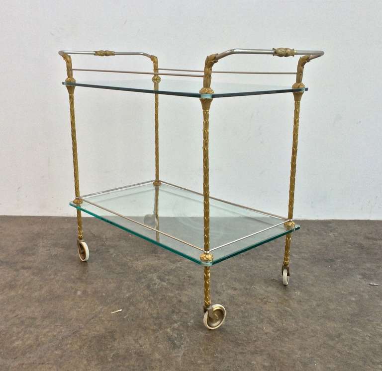 Neo-Classical Serving Cart in the Style of Maison Bagues
circa 1960
gilded bronze, steel, glass
35 x 18 x 32 inches high