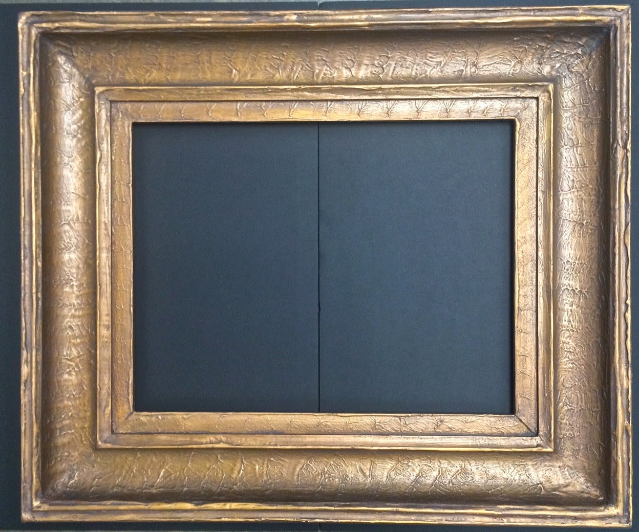 California Frame
late 19th/early 20th century
carved, gilded gessoed redwood
Exterior: 39 x 33 inches
Interior: 23 x 13 inches
excellent condition