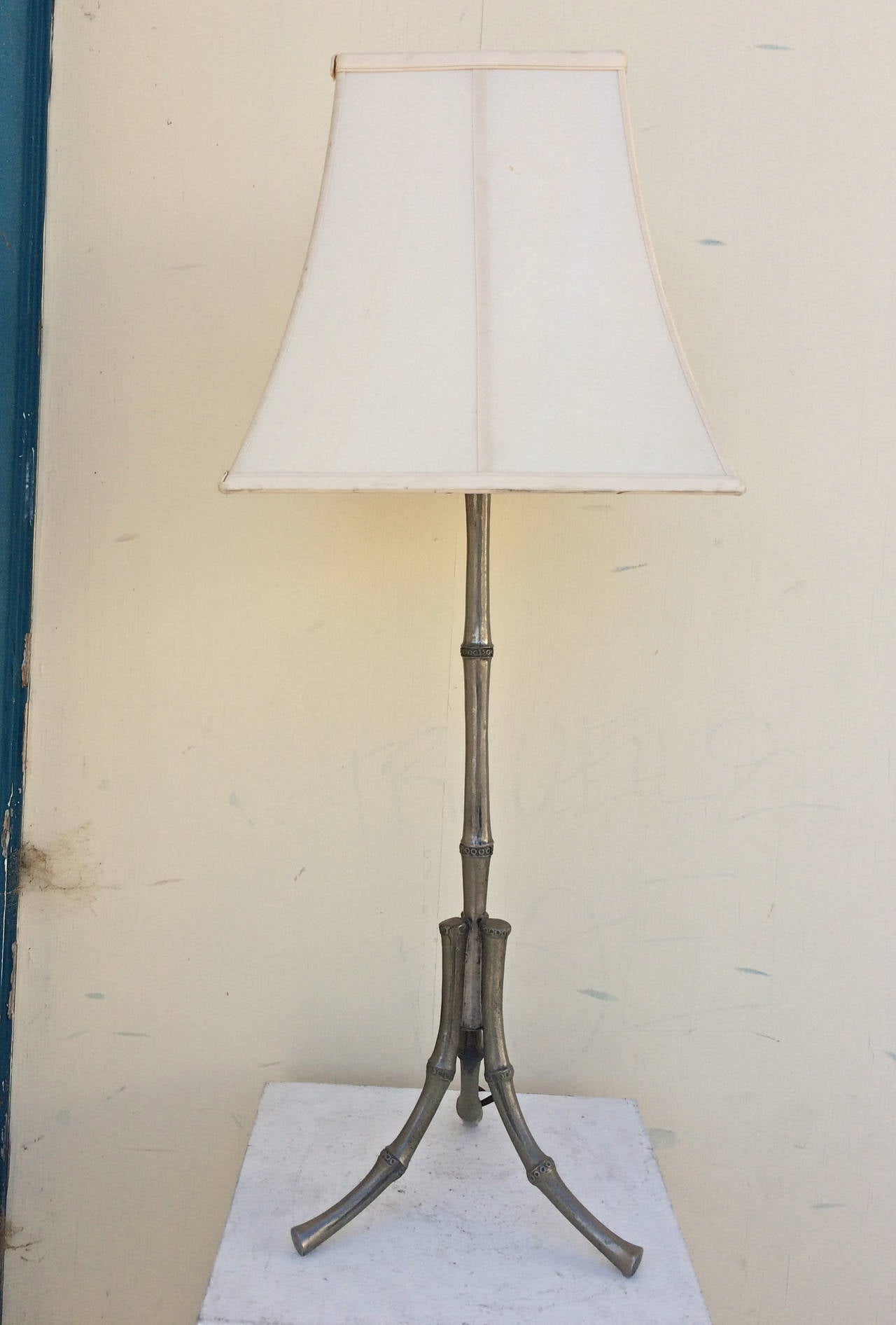 Hollywood Regency Faux Bamboo Table Lamp
circa 1960
nickel-plated iron
32 inches high with shade