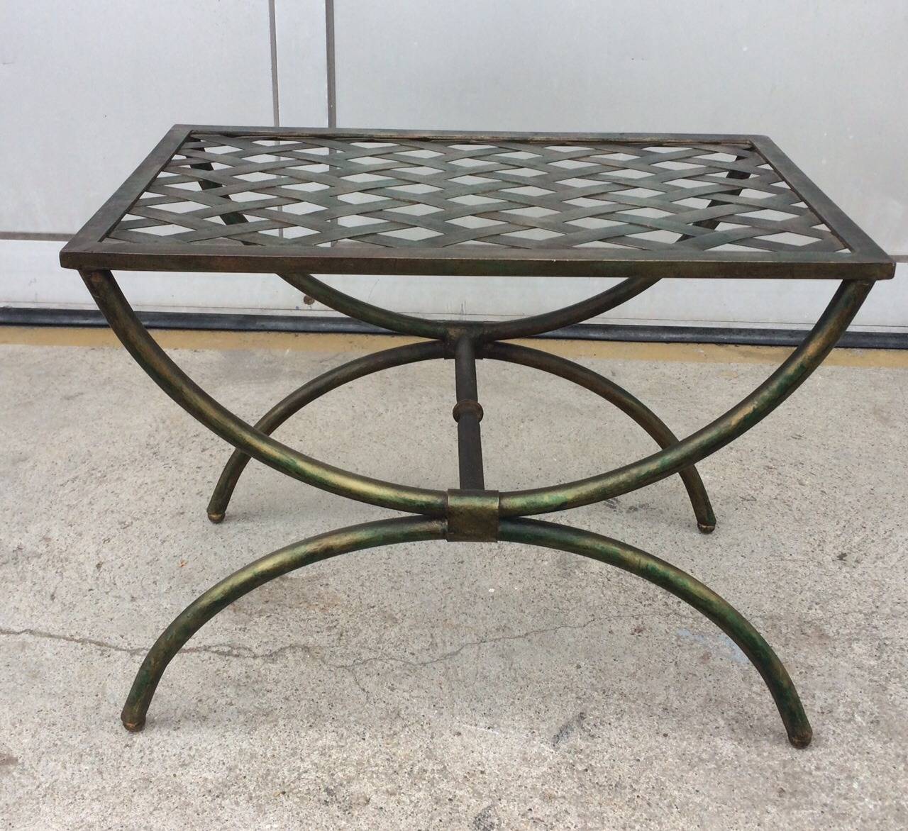 Hollywood Regency Bench
Circa 1960
Brass, gilded, dyed surface
approx 14 x 21 x 12 inches
Stamped made in italy underneath
excellent original condition