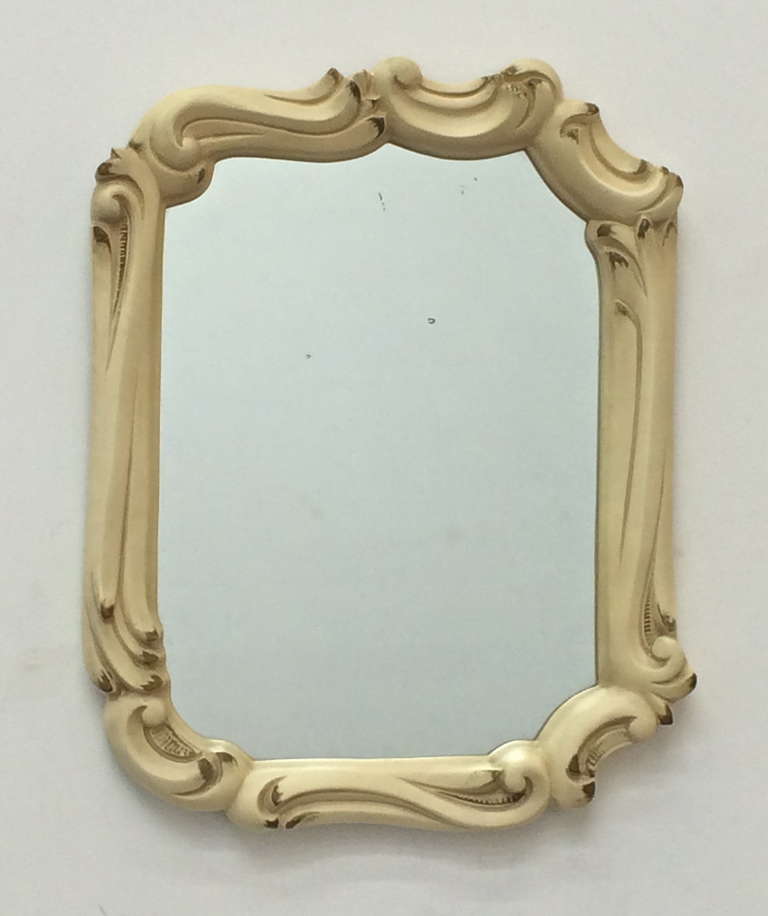 Mirror in the style of Serge Roche
painted cast plaster
circa 1940s
28.5 x 22.5 x 2.5 inches
Excellent original condition