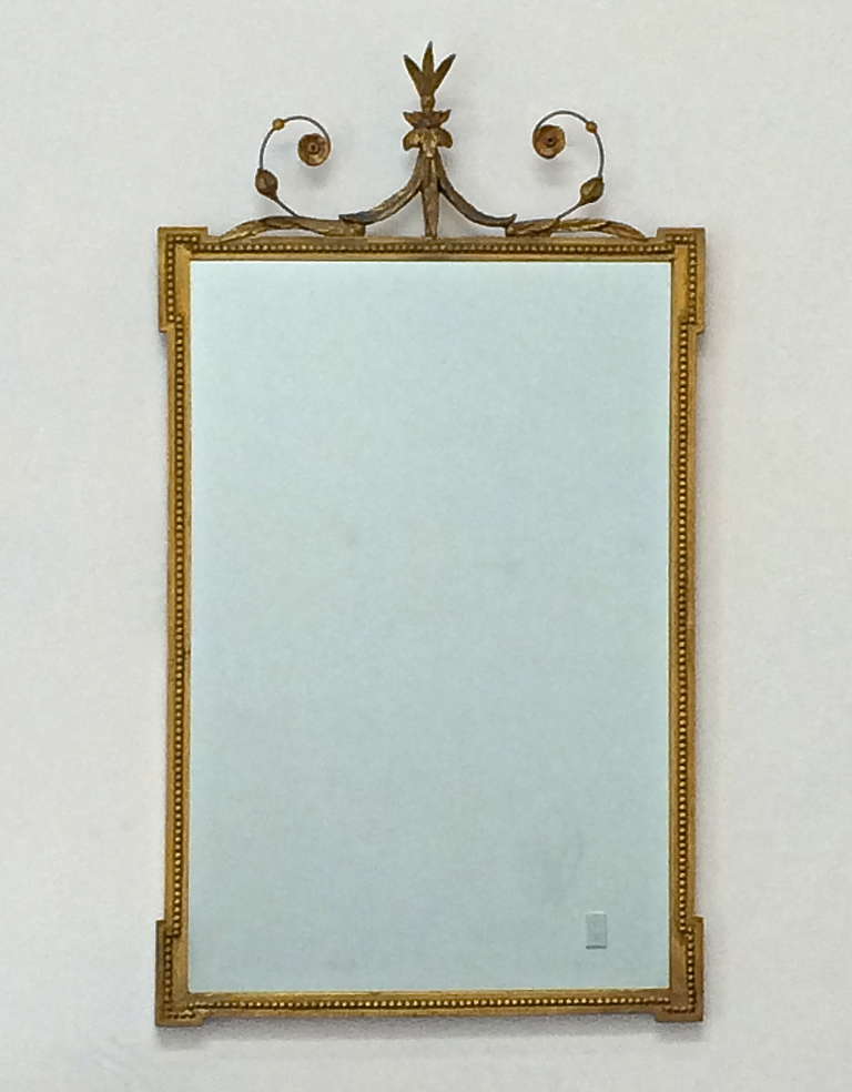 Neoclassical Style Mirror
circa 1940s
carved wood, gesso, gilding
original glass and backing
47.5 x 26.5 inches