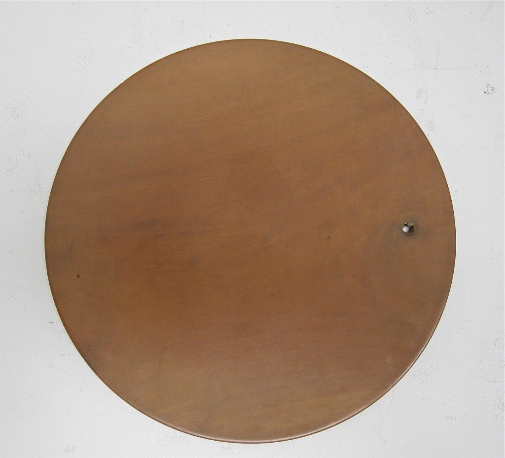 James Prestini, hand-turned walnut charger. Circa 1950s. Approximately 15 inches in diameter. 
James Prestini pioneered his smooth-as-glass wood-turned bowls and chargers in the 1940s at the Chicago Bauhaus where he worked with Mies Van Der Rohe