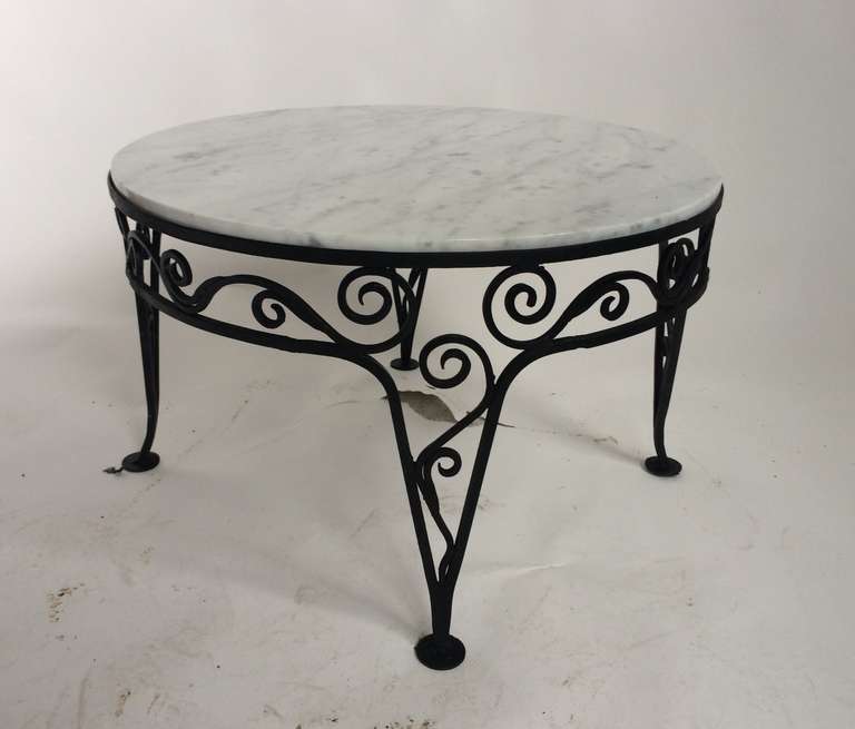 Art Deco Coffee Table
circa 1930
Wrought iron, carrera marble
25 inches in diameter, 15 inches high.
Very good condition