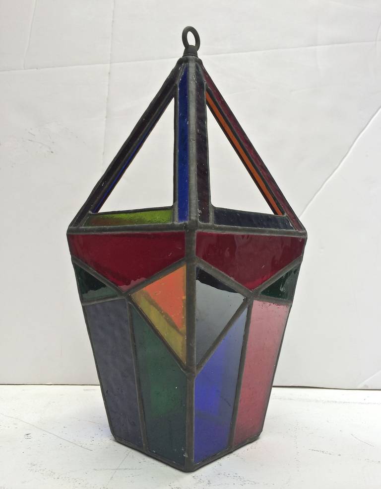 Hanging Lamp
circa 1950
stained glass, lead
15 inches high x 6.25 inches square
One barely visible internal crack; otherwise excellent condition