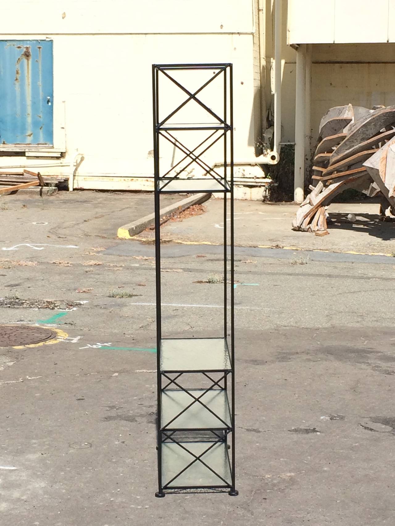 Six-Shelf Etagere
circa 1950
Wrought Iron frame, faux bois x-braces, rippled glass, landing pad feet
84 x 24 x 13 inches
Excellent original condition