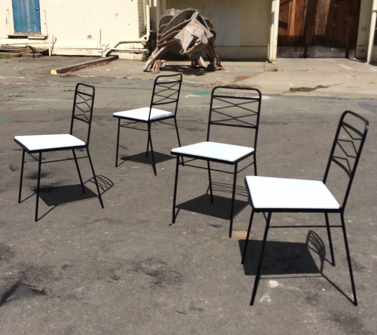 Set of Four Modernist Wrought Iron Chairs