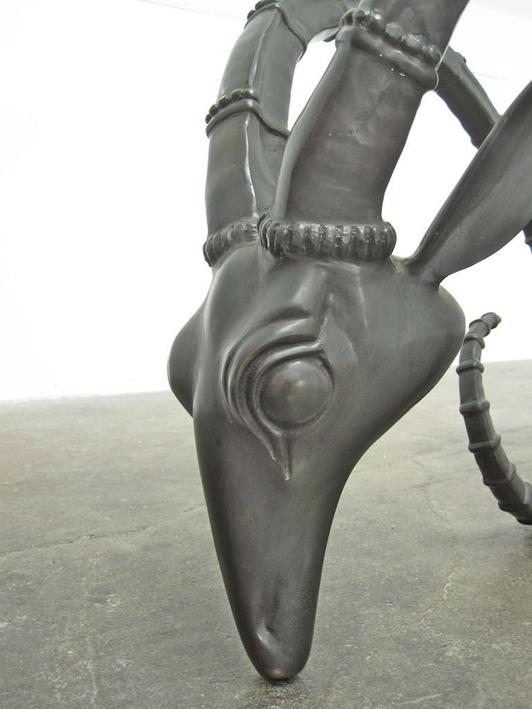 French Cast Brass Rams Head coffee table by  Léon François Chervet
