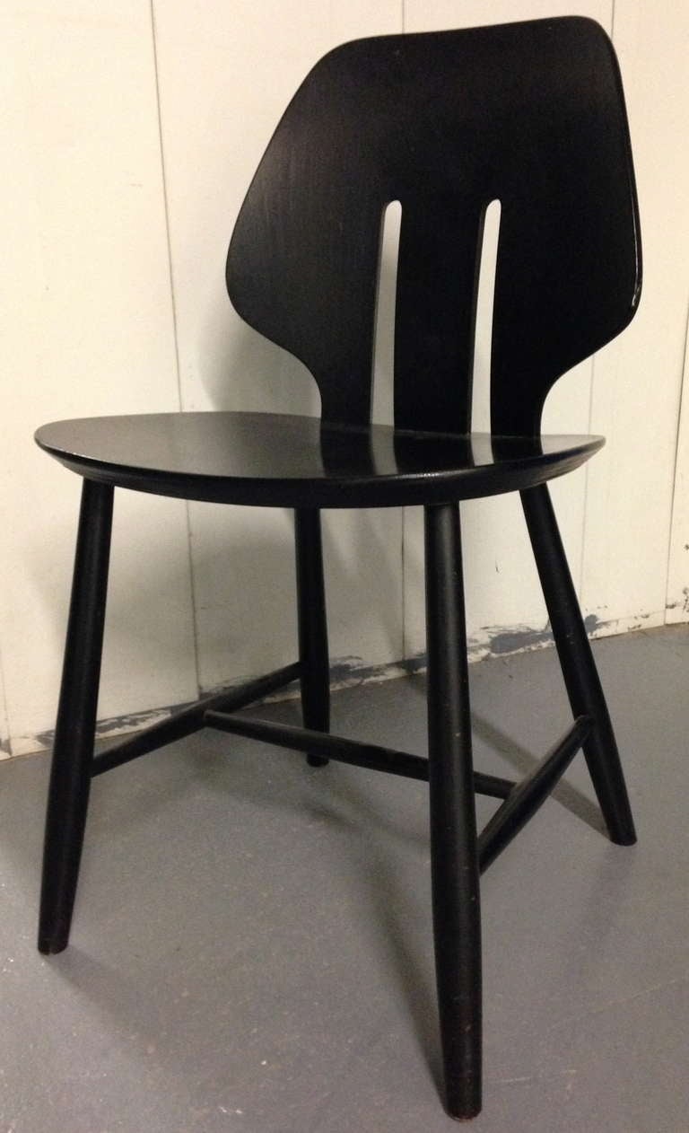 Four ebonized wood side chairs with bentwood cutout back. Stamped to underside.