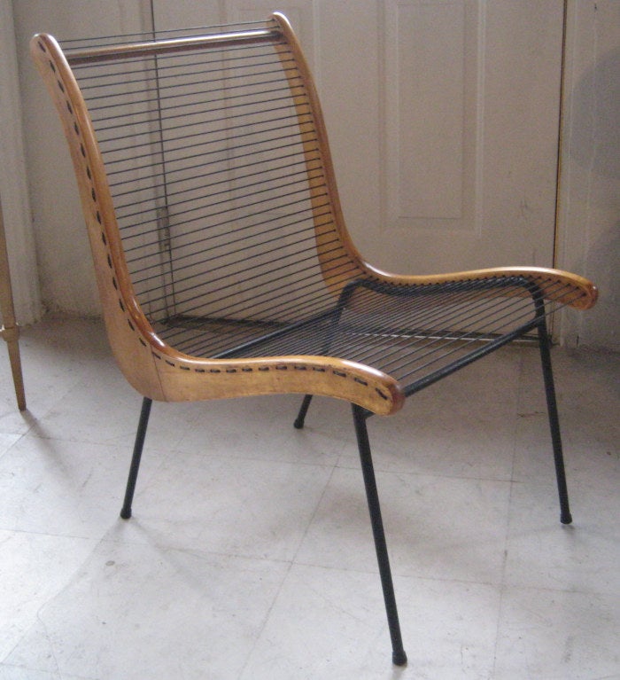 Great mid-century design by Boston architect Carl Koch for Tubbs of Vermont. Tubbs produced snow shoes in the mid-19th century, and later made innovative chairs out of the very same  snow shoes in the early 20th century.  This modern design reduces