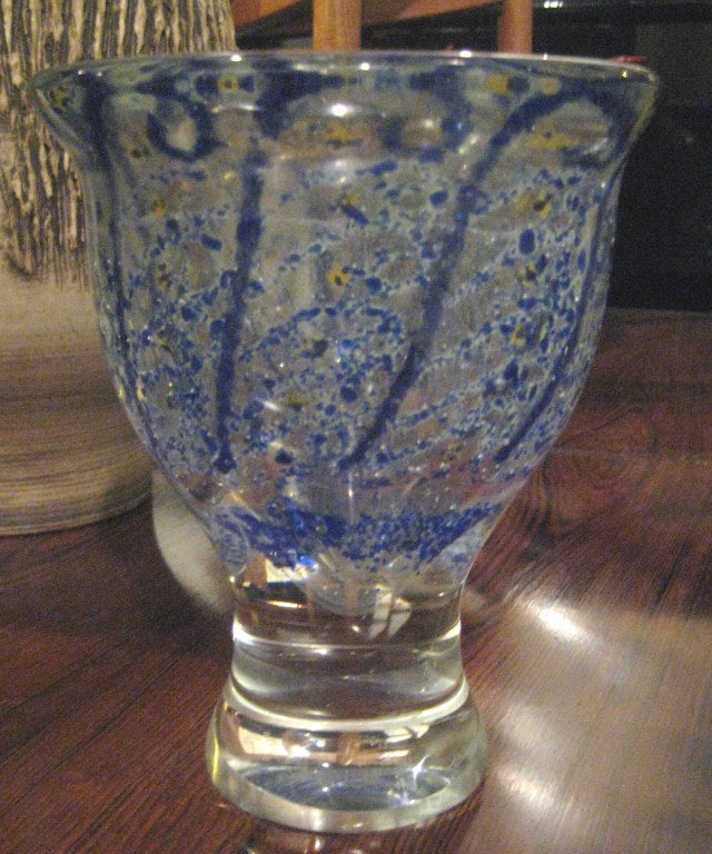 Large, highly decorated footed vase is a unique object from the Netherlands most celebrated glass designer. This is considered to be copier's high period for design, and also his lowest for output. It is estimated that the Leerdam factories were