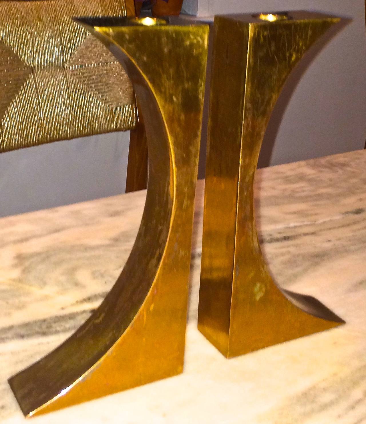 Chic, elegant modernist candle centerpiece in solid cast bronze with gilt finish. Signed 