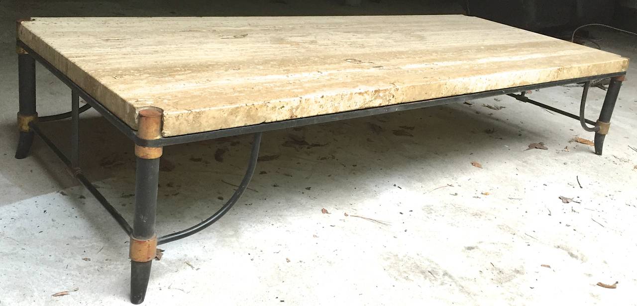 Chic 1940s table with saber legs and curved stretchers, bronze doré´ decoration, and an inset 11/2