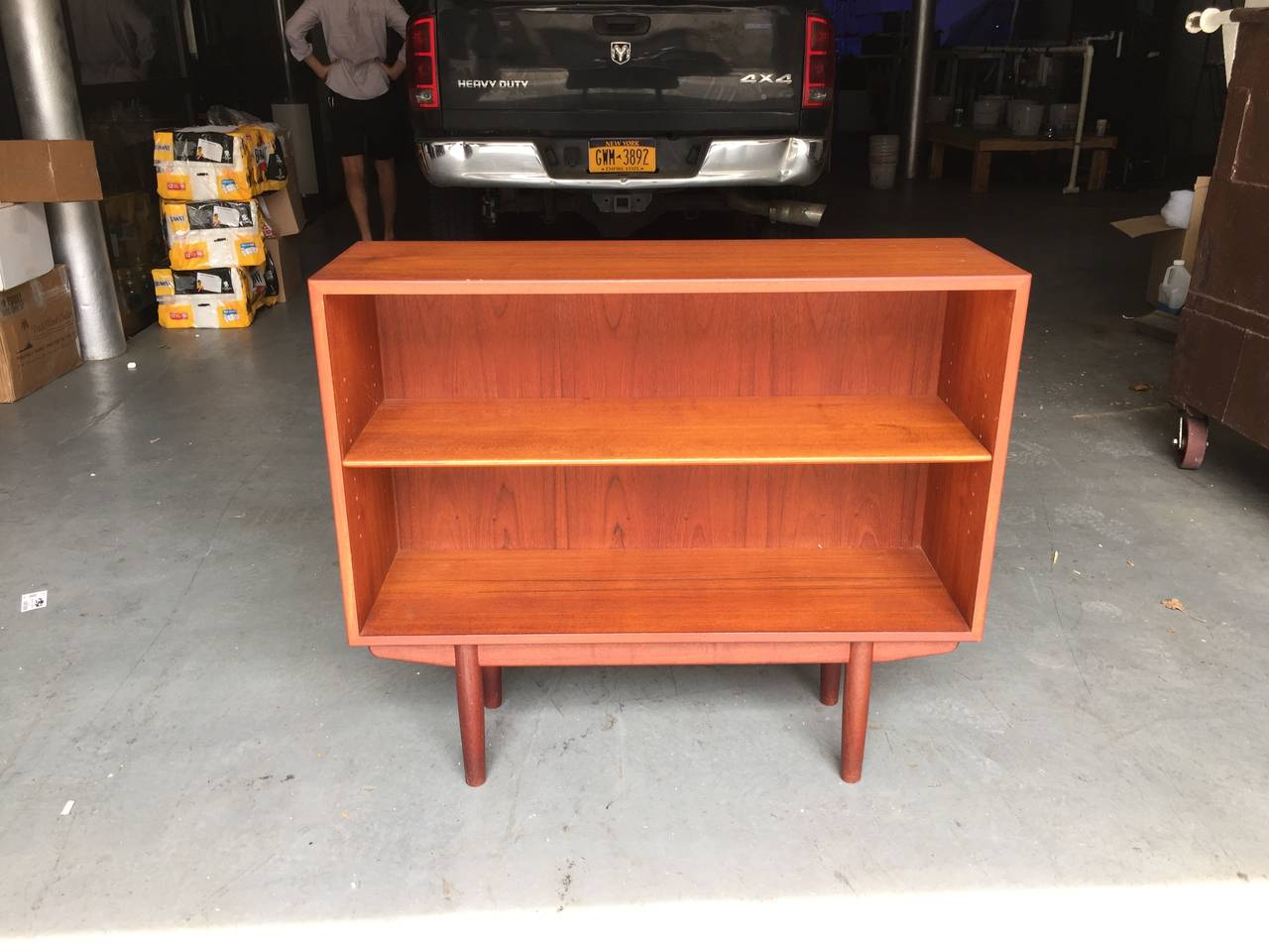 Handsome set of matching bookcases with warm original teak finish. Single shelf is adjustable. Soborg stamp to back of each case.