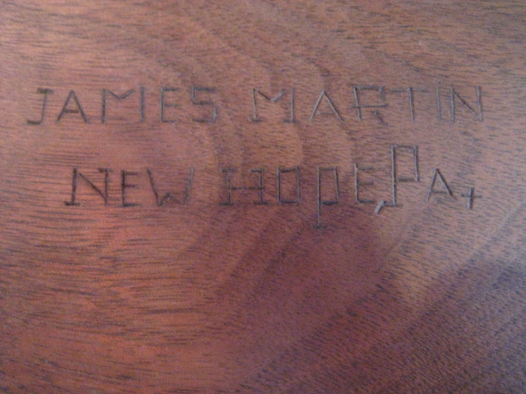 Renowned master woodcarver, James Martin was the head woodworker in George Nakashima's studio for most of the 1950s and 1960s.     This delicately carved box shows off Martin's unique style.