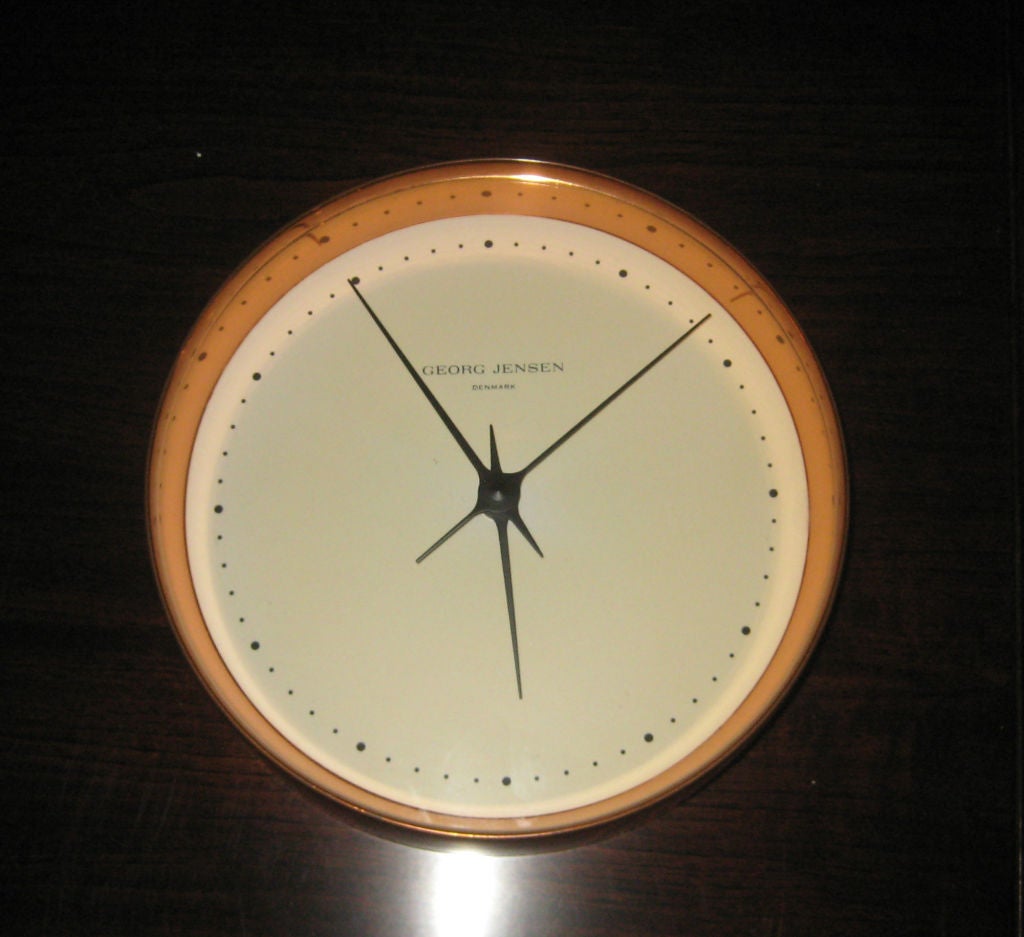 Rare copper rimmed clock from famed modernist silver designer. The copper version of this clock has been out of production for decades.