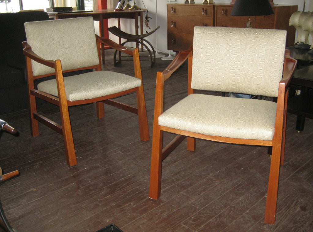 Generously proportioned occasional chairs, handmade in Mexico employing traditional woodworking techniques. 

Wonderful details including reverse tapered legs and intricately carved armrests imbue the chairs with a strong Mexican rustic modernism.