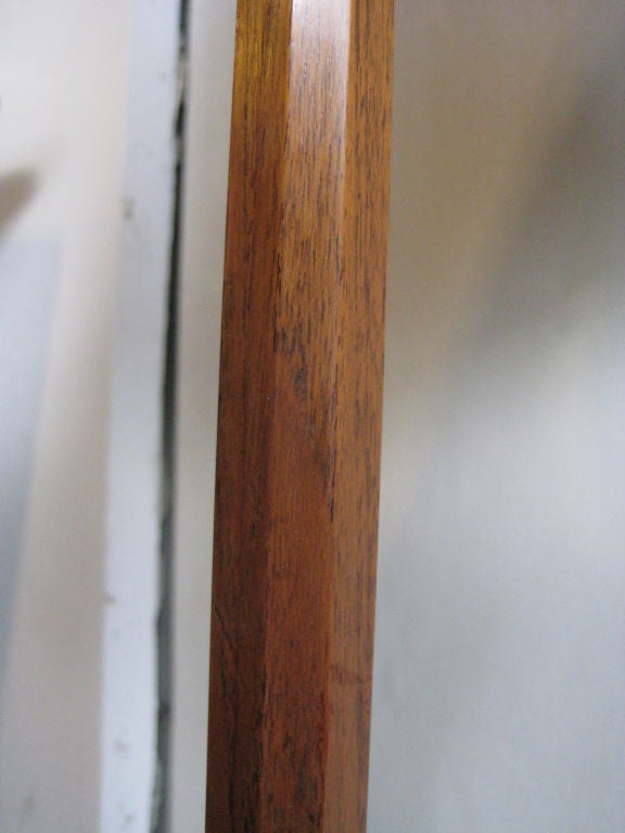 Tapered, eight-sided solid mahogany stem on octagonal nickeled base, with nickeled brass hardware at the top. Stamped 