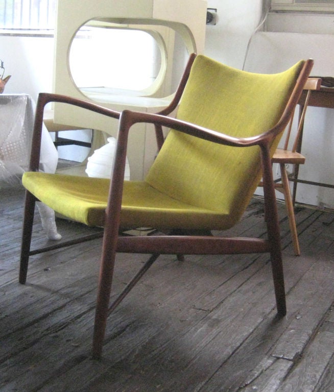 Early example of iconic Finn Juhl design. Original finish and wool upholstery.  In consideration of serious collectors, this chair is currently untouched, uncleaned, and 