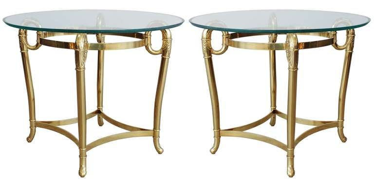 Exquisite pair Italian empire style brass end tables with 1/2 inch bevelled glass tops.