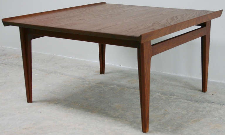 Handsome teak side or coffee table designed by Jens Risom.