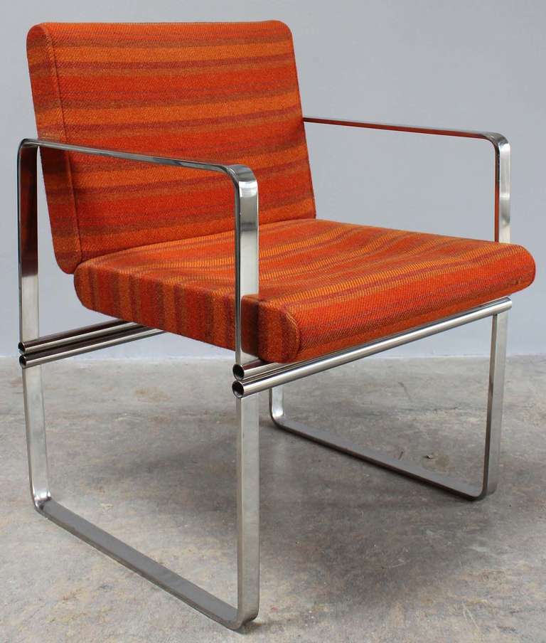 A pair of 1970's chrome frame chairs in original upholstery.