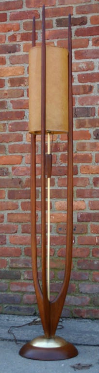 Sculptural walnut and brass floor lamp with original shade by Modeline.