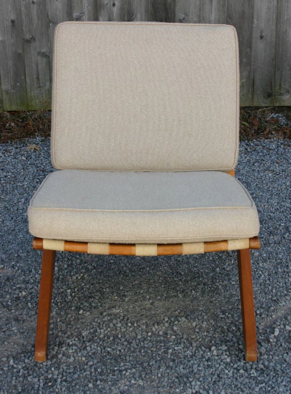 Simple and elegant maple frame slipper chairs with brushed aluminum detail; in vintage original upholstery