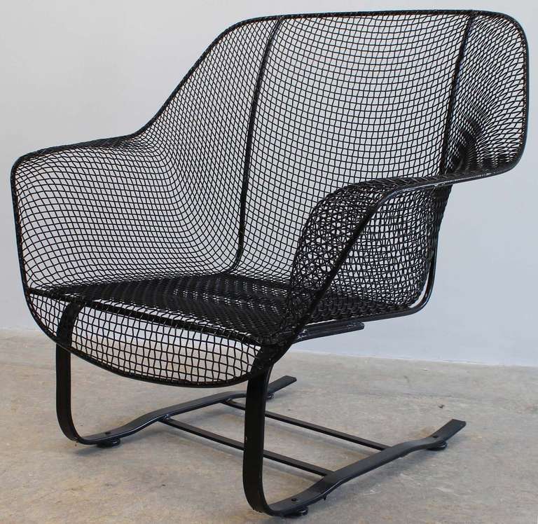 Russell Woodard Sculptura cantilever iron and mesh lounge chair.