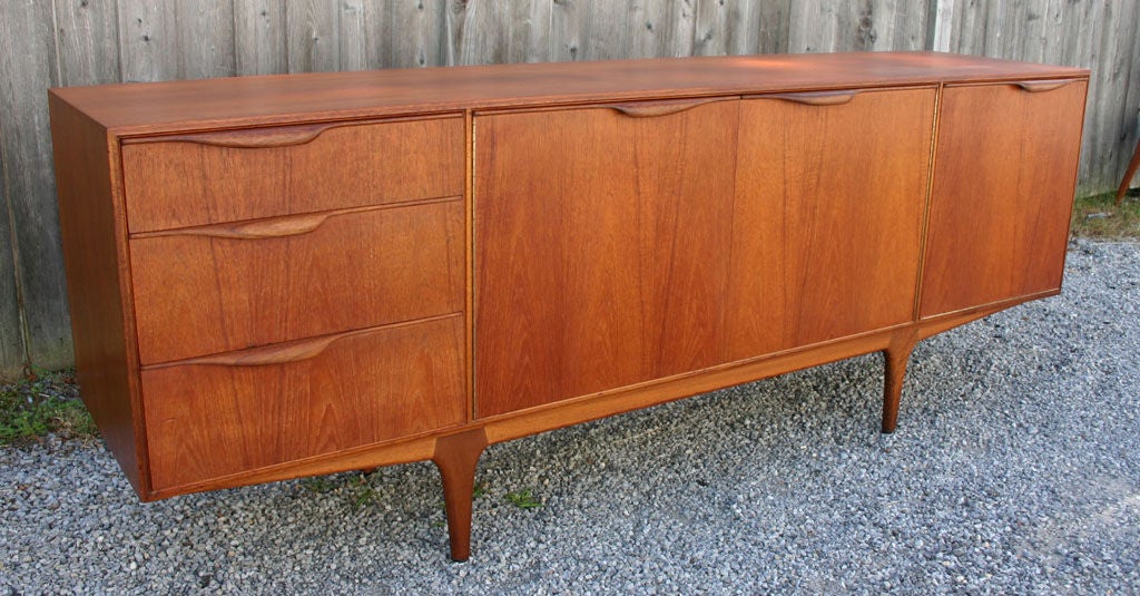 Simple yet elegant all teak sideboard / cabinet by A.H. McIntosh & Co. Ltd, Kirkcaldy, Scotland.