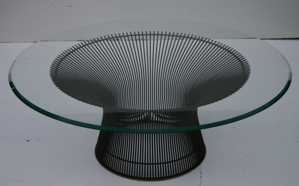Classic welded metal table with glass top designed by Warren Platner for Knoll.