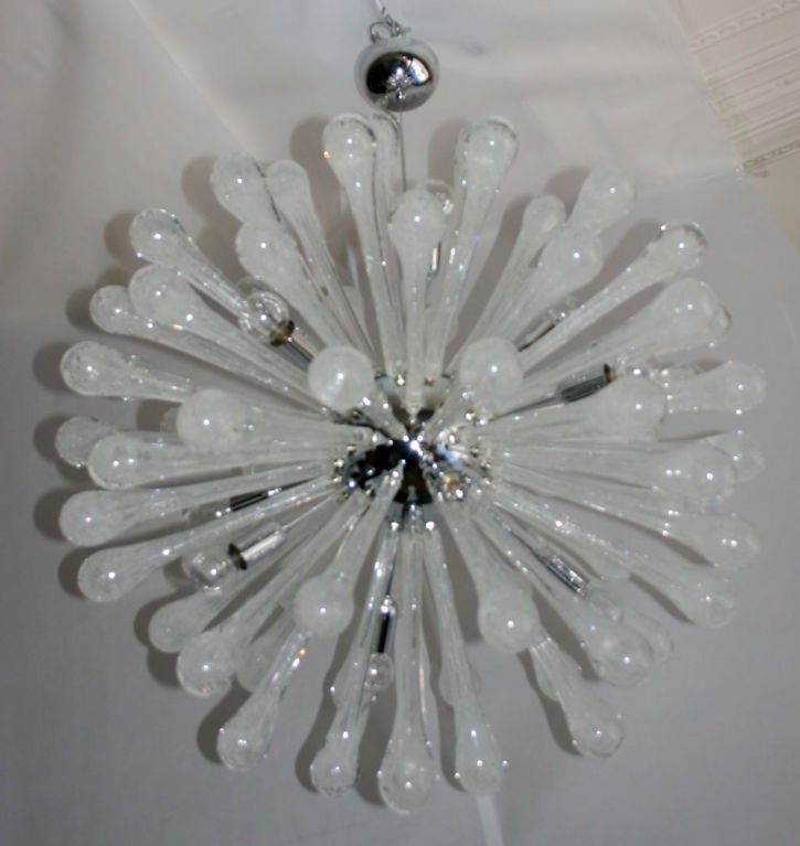 Spectacular chrome sputnik fixture with Murano glass rods.